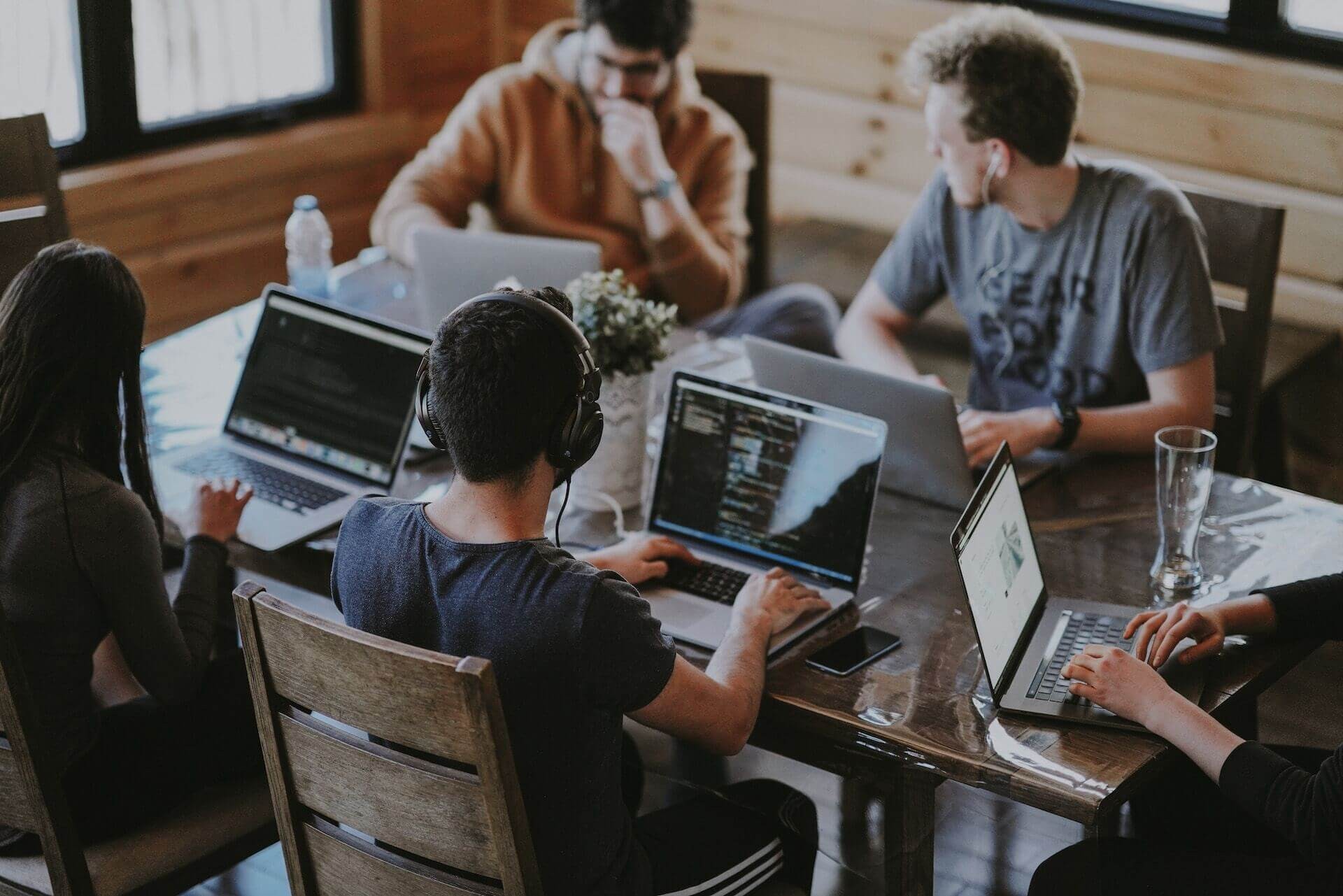 team working together and sitting at the table