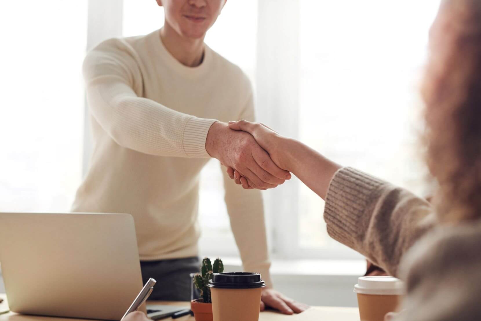 people handshaking